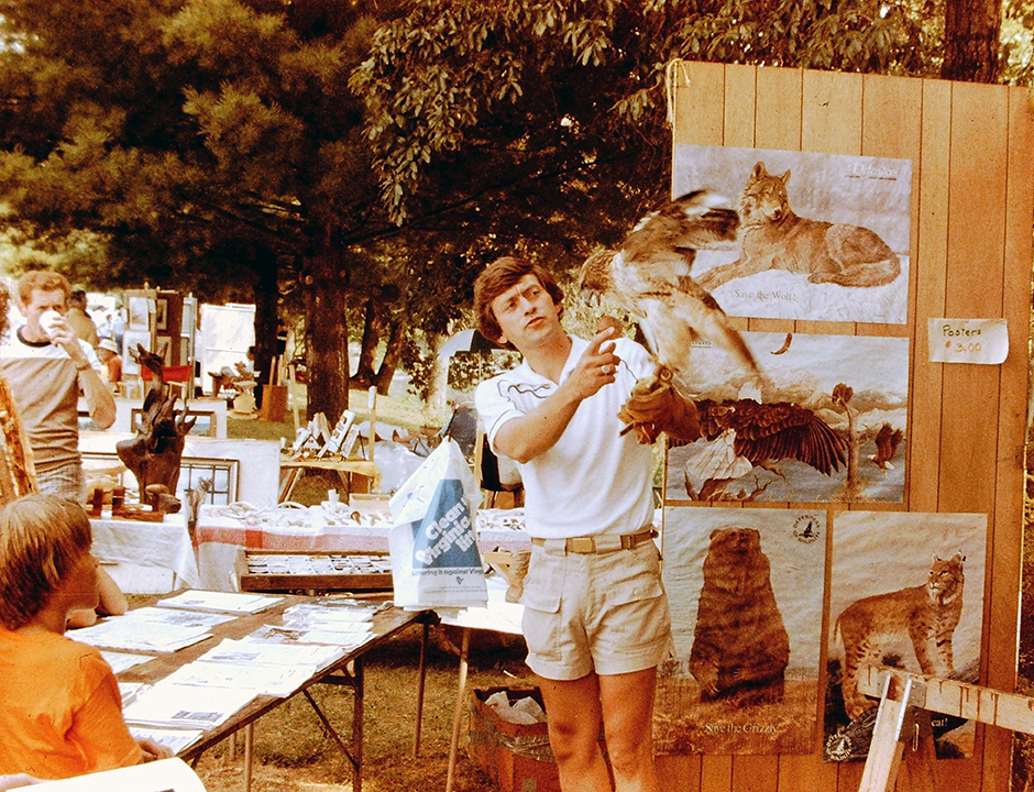 Vintage photo of Ed Clark with Red-tailed Hawk named RT