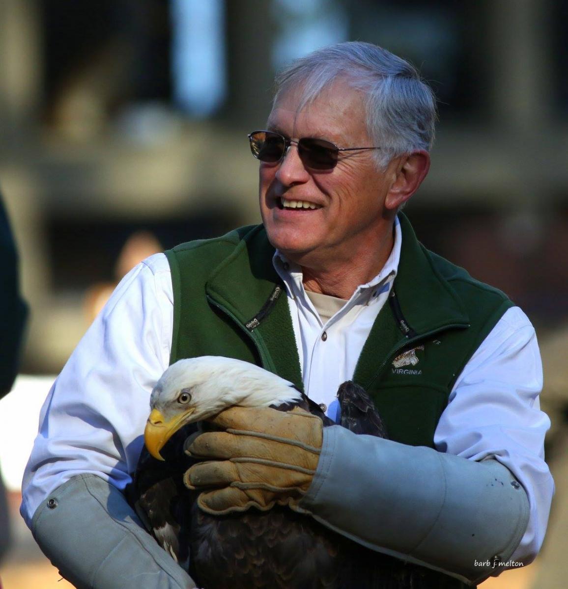 Ed Clark with a Bald Eagle prior to release to the wild